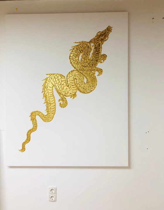 Golden dragon on white