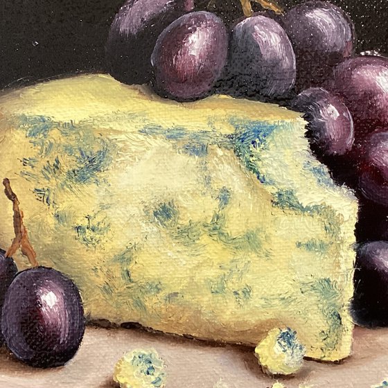 Cheese and grapes still life