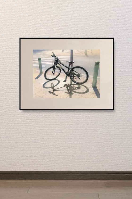 Shadow of a Bicycle on the Pavement