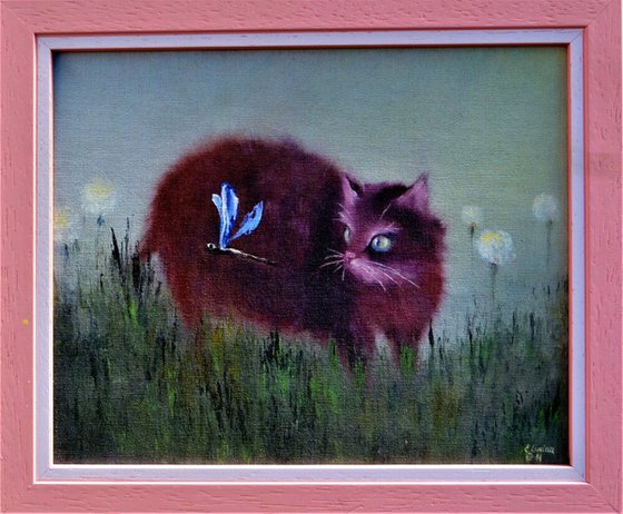 Cat and dragonfly