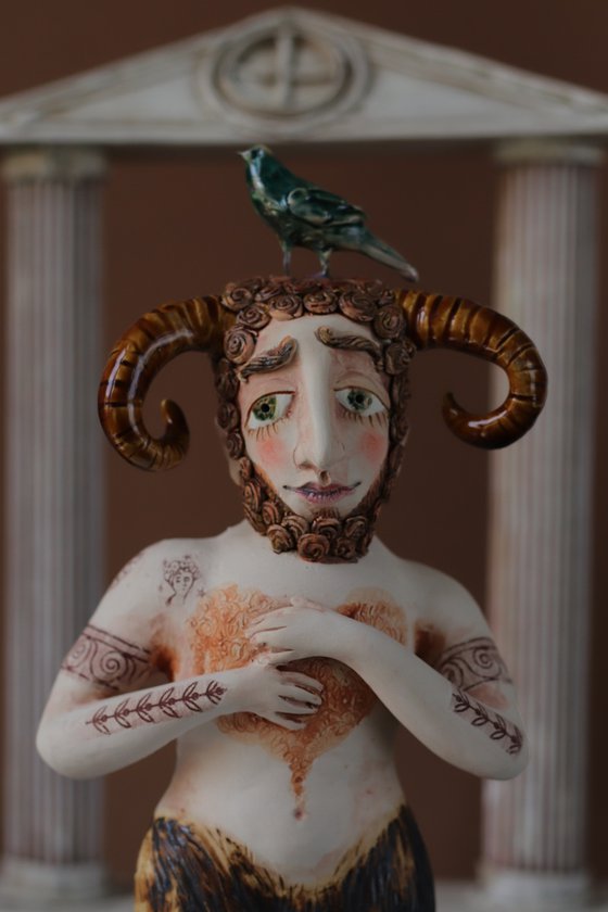 Faun with a bird.