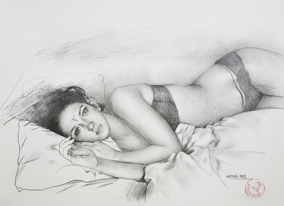 Woman Lying on a Bed