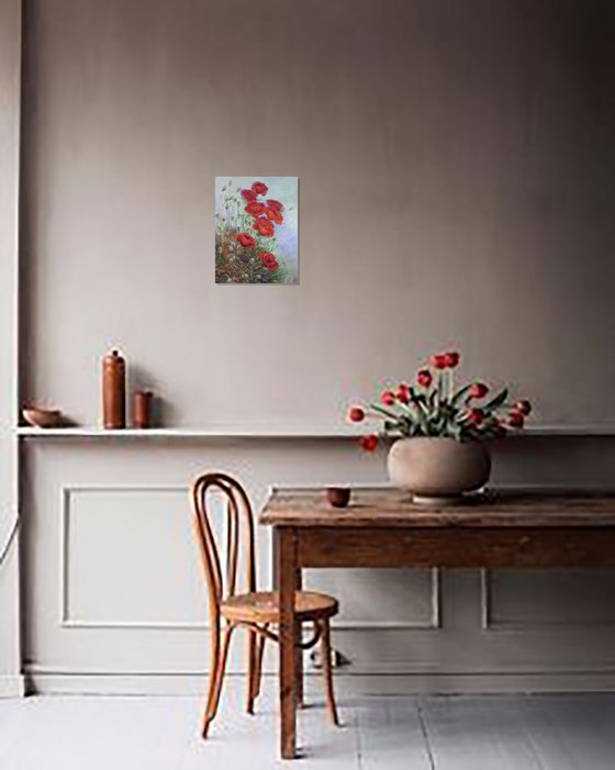 Poppies with wild flowers.