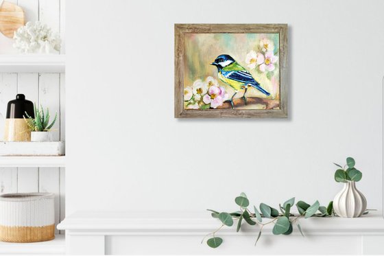 Chickadee on flowering branch
