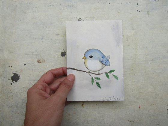The tiny blue bird
