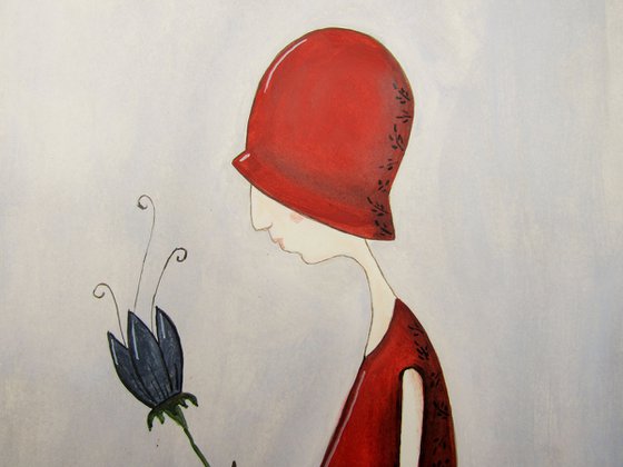 The girl in red with a flower