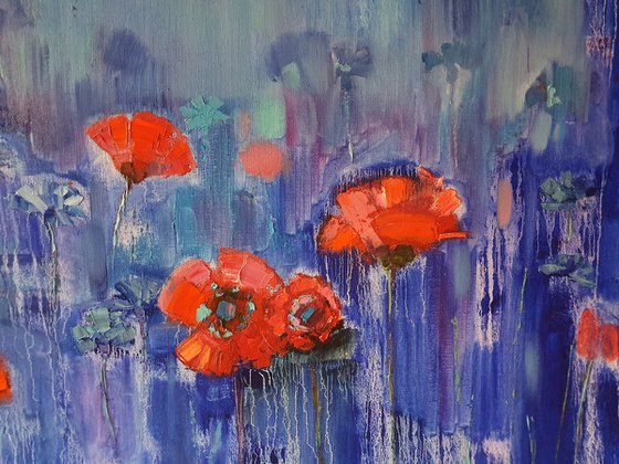 Poppies on blue