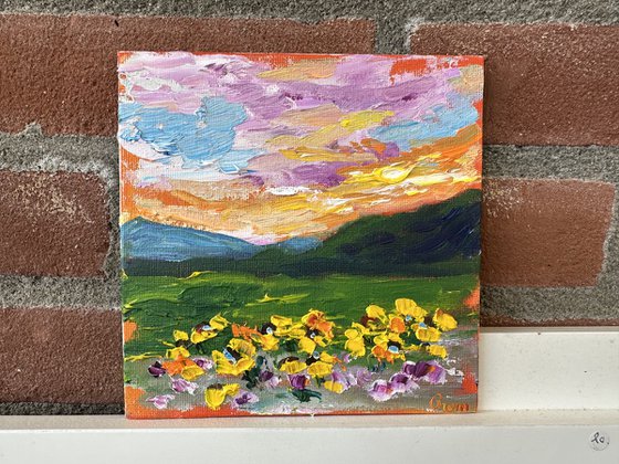 Orange sunset with flowers