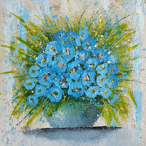 VASE OF BLUE FLOWERS