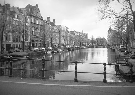 A Moment On The Bridge In Amsterdam