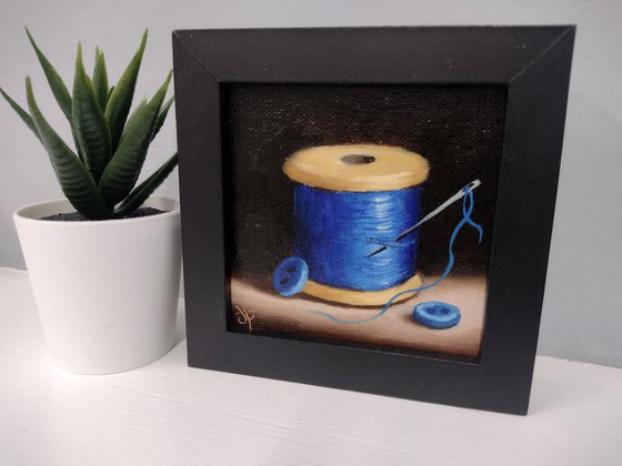 Little Blue cotton reel  still life