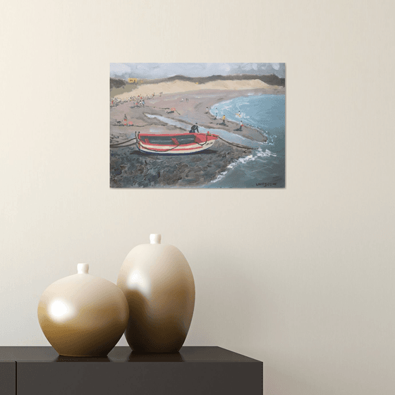 Red boat on the beach