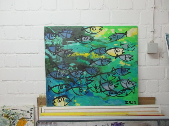 blue fishes jumping