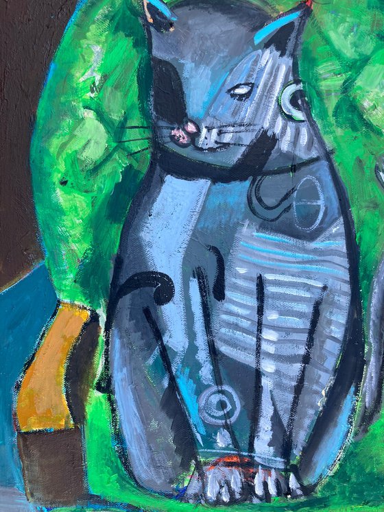 Cat in a green sofa