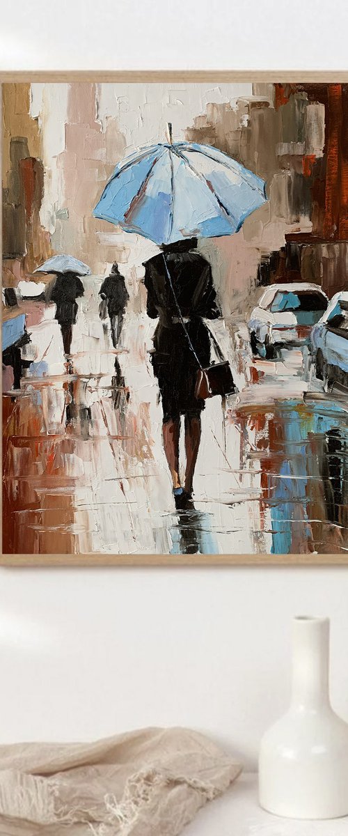 Woman with umbrella in a rainy city. by Vita Schagen