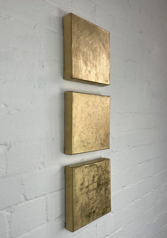 Wisdom diptych- 20cm squ (x3) - metallic gold paint on canvas