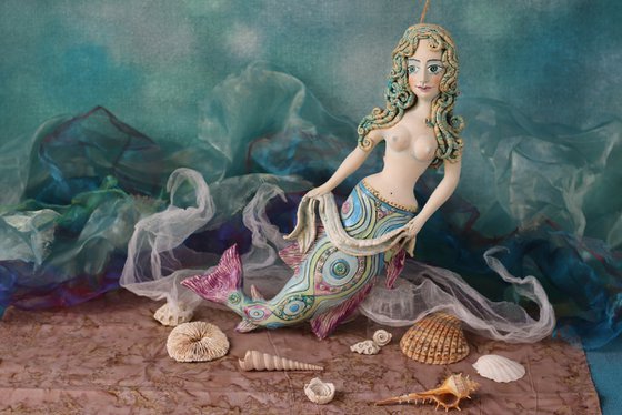 Mermaid with blue hair,  Wall sculpture by Elya Yalonetski.