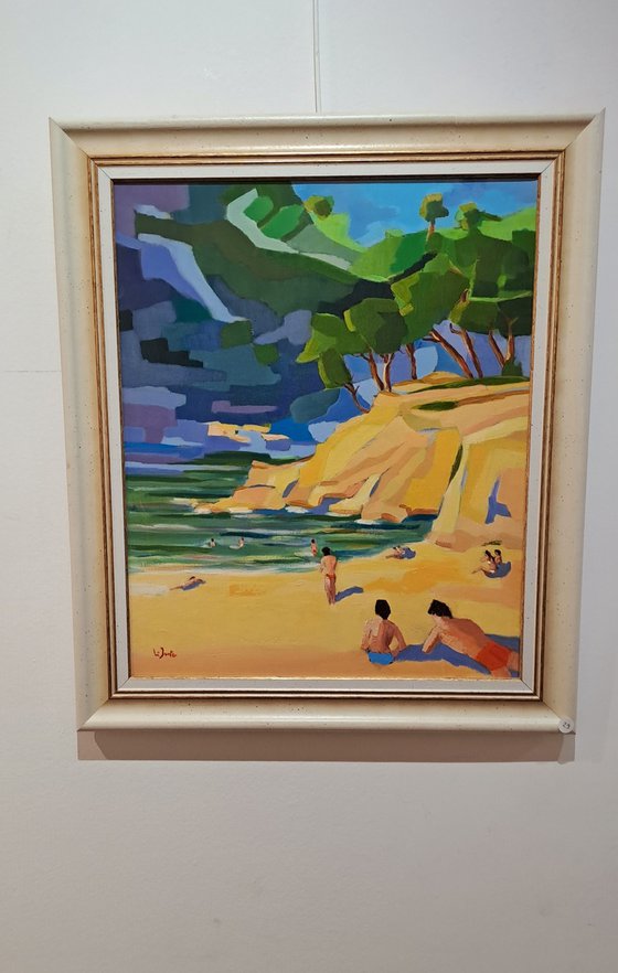 Bathers in Mediterranean cove