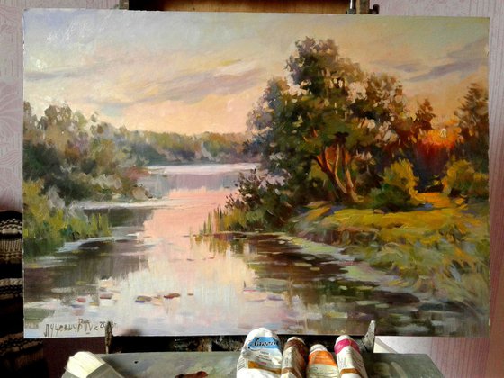 Landscape with river at sunset