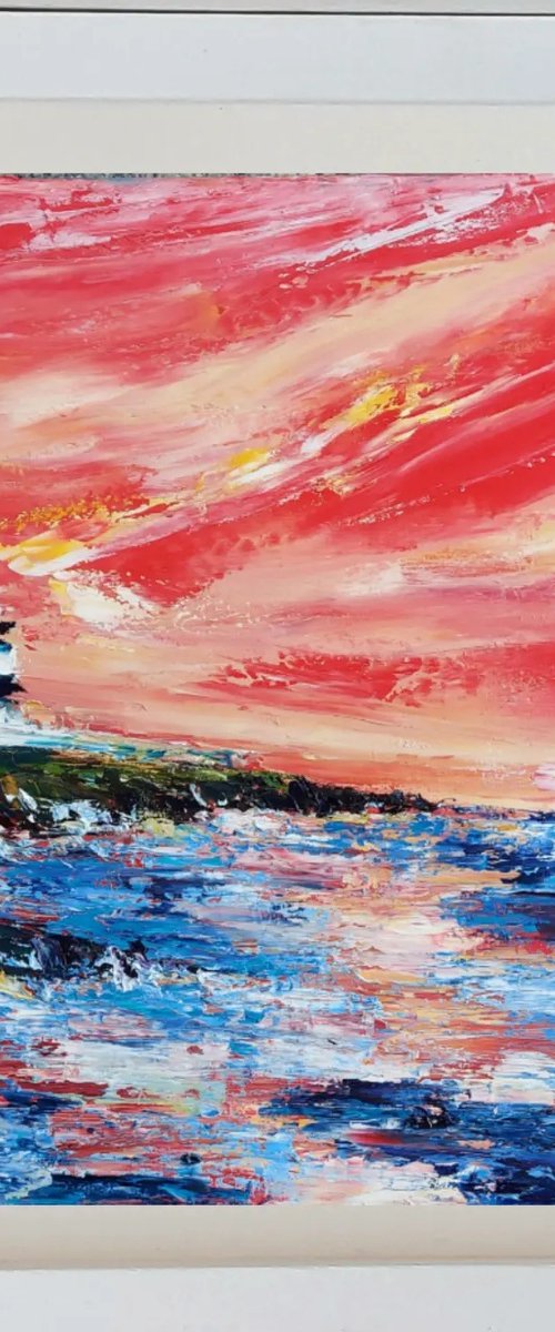Red sky delight over Hook Head Lighthouse, Wexford by Niki Purcell