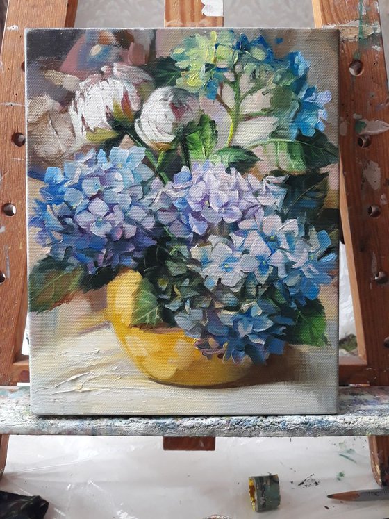 Blue hydrangea and peonies