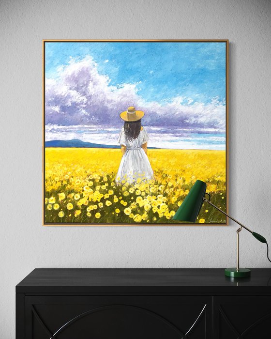 Summer. Woman in flower field