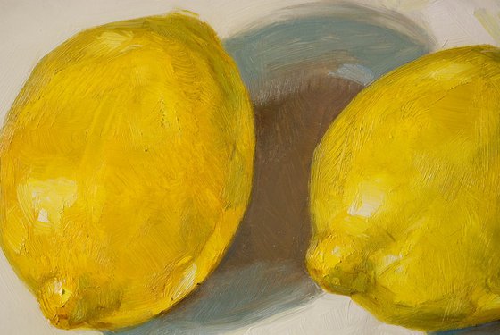 large modern still life of yellow lemons