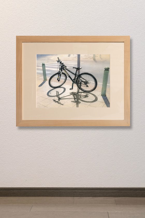 Shadow of a Bicycle on the Pavement