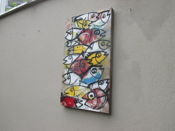coloured fishes jumping