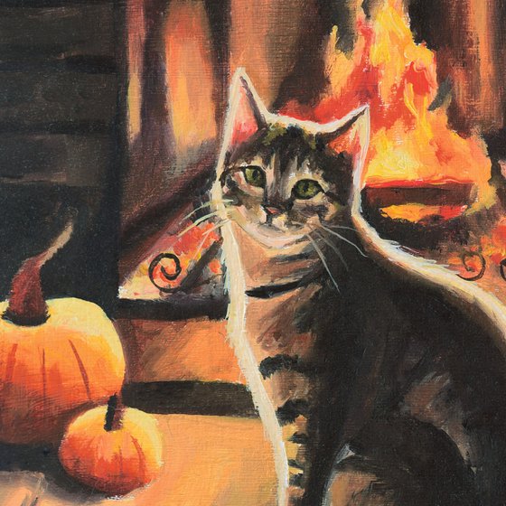 Cat in a cozy autumn fireplace
