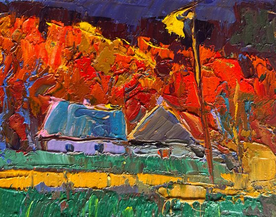 Crimson autumn in the village