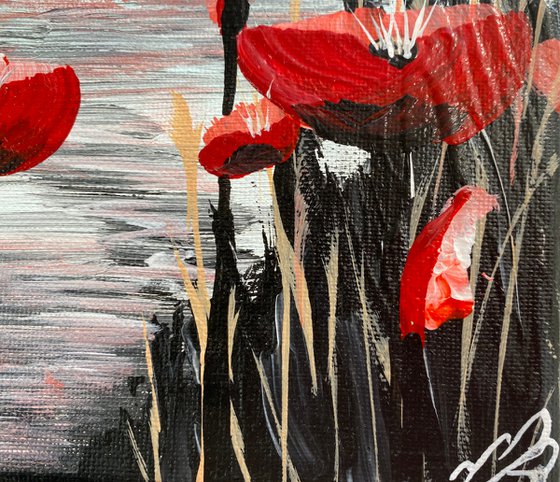 Abstract poppies against a blue sky