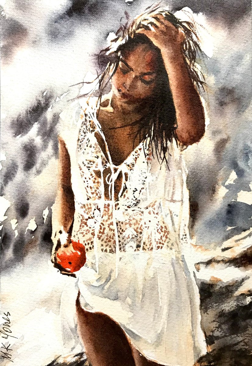 Woman holding an orange by Monika Jones