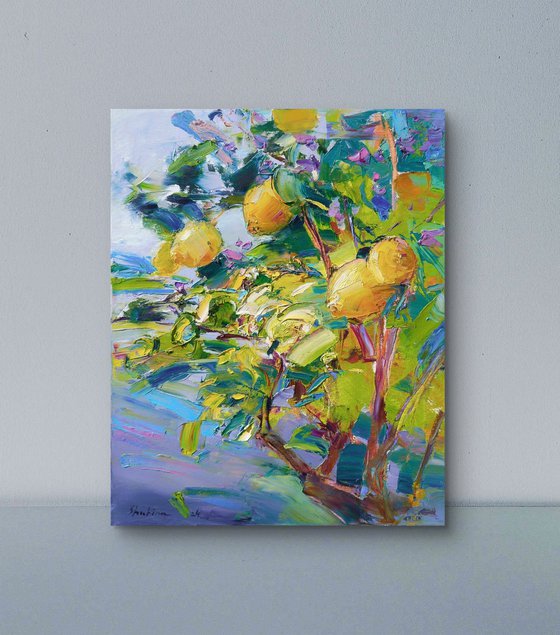 Lemon tree on grey blue