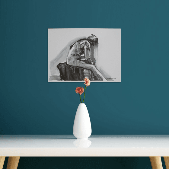 Seated male nude