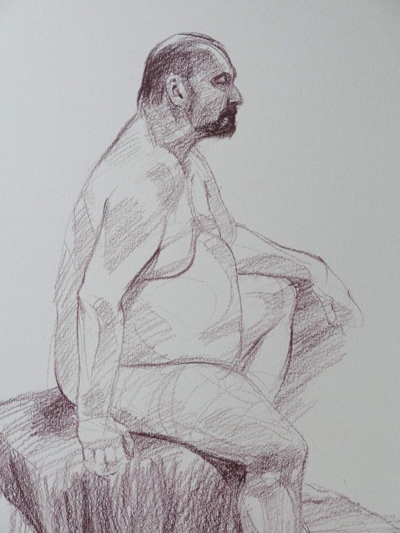 Seated male nude