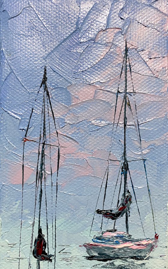 Sailboats at tender sunset