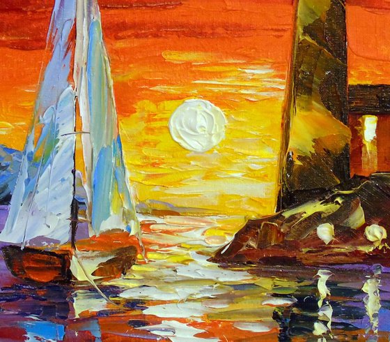 Sailboat and lighthouse