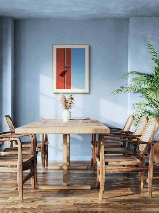 Red wall with a lamp