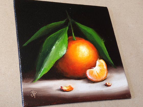 Small Clementine with segment still life