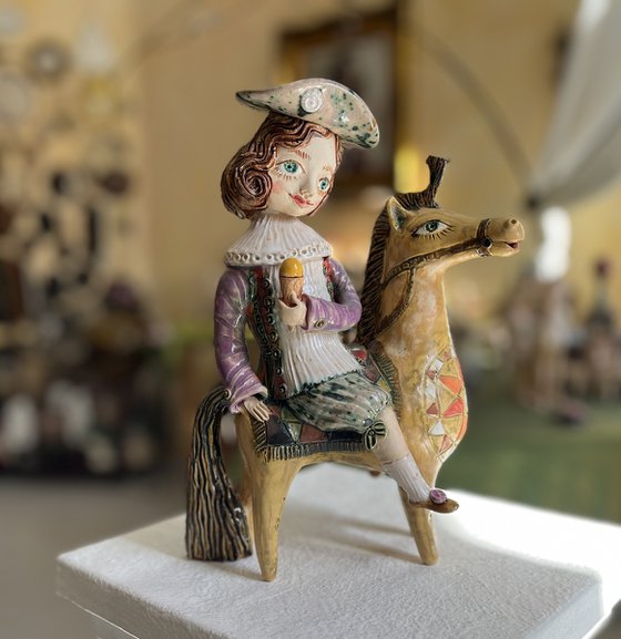 Vintage dressed girl with ice riding horse.