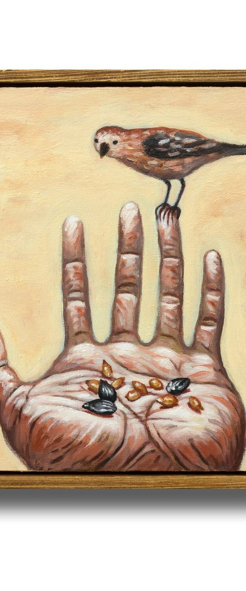Hand with a bird by Oleksandr Korol