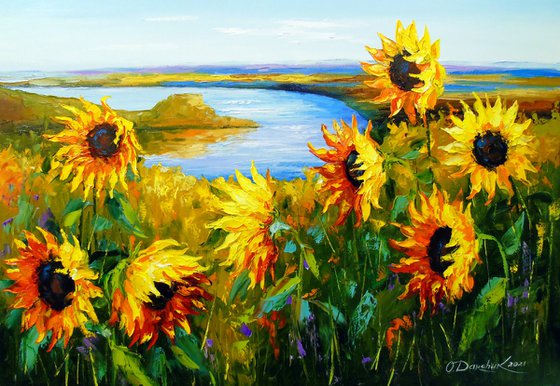 Sunflowers in the wind by the river