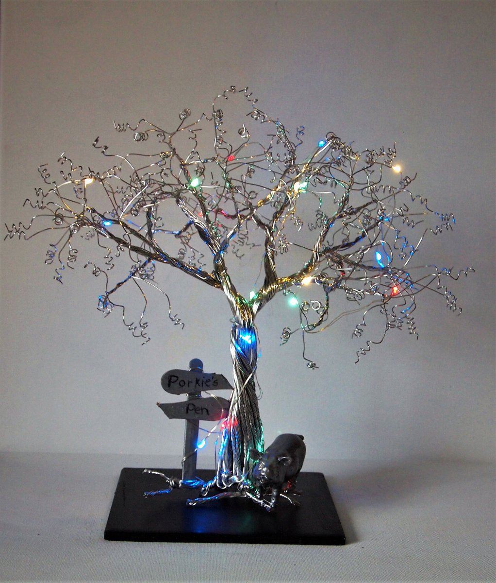 Silver wire tree sculpture with pig, signpost and LED lights by Steph Morgan