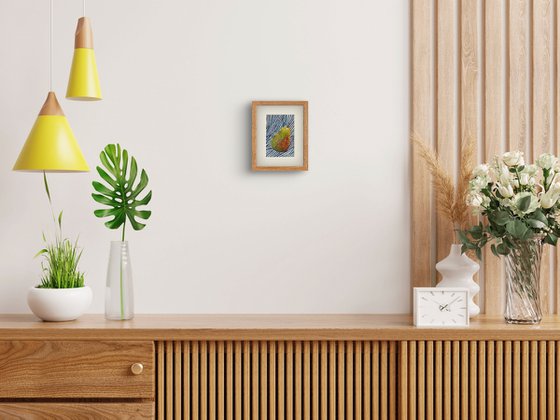 Green pear on blue