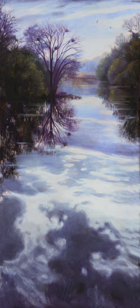 Landscape. Clouds are reflected in the water.