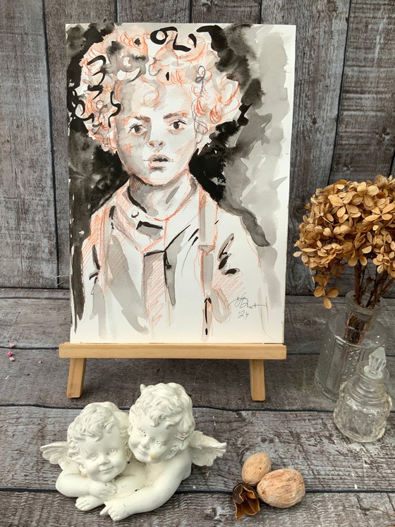 Portrait of a curly-haired boy