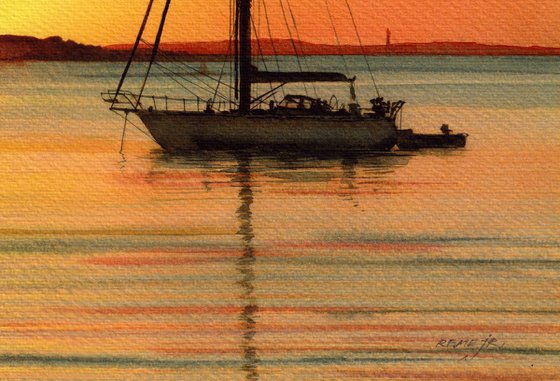 Sunset with boat in the sea