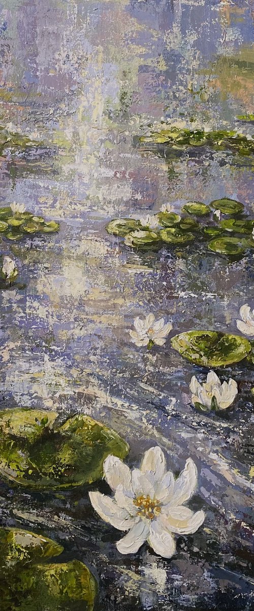 Rain on Lilly pond by Colette Baumback