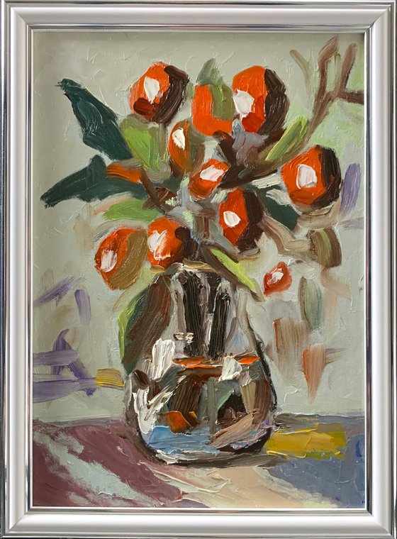 Olive branch in vase.